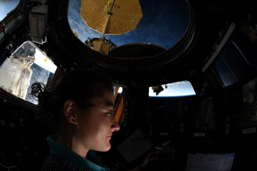 NASA astronaut Christina Koch makes observations from the International space Station’s cupola.
