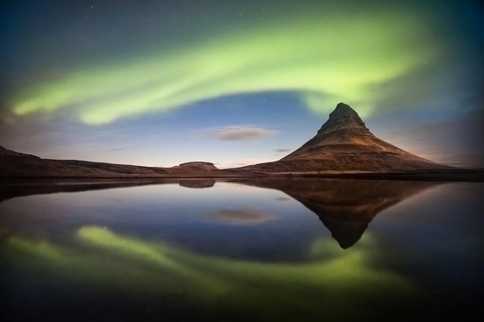 This Northern Lights picture is the Grand Jury Winner titled "Eruption of the Light". The image was taken by Petersvoboda.