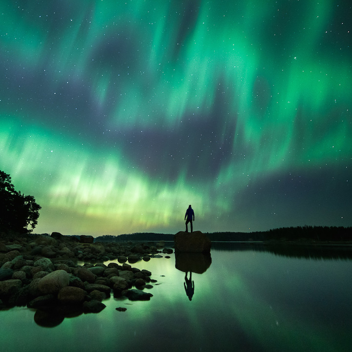  Auroras can be seen with startling clarity in this gorgeous image by  Mikko Lagerstedt who has quite a marvelous collection of astrophotographs