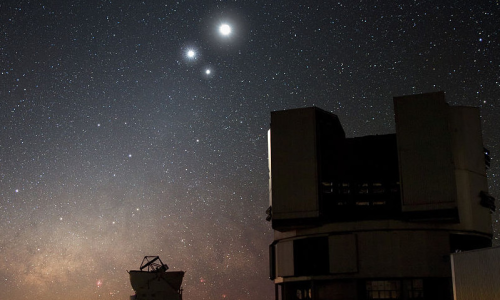 The Moon in conjunction with Venus and Jupiter, with the Very Large Telescope in the foreground. Image © Y. Beletsky, 2009. April astronomy event