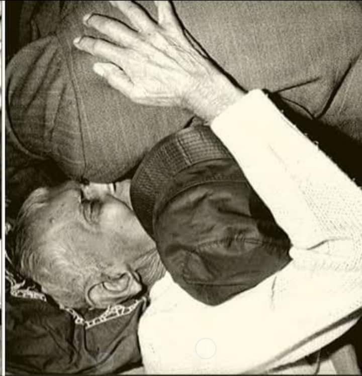Noble moments; Professor Anilendra Ganguly hugs his student, Dr. Salam after he put his Nobel Prize medal around his neck.