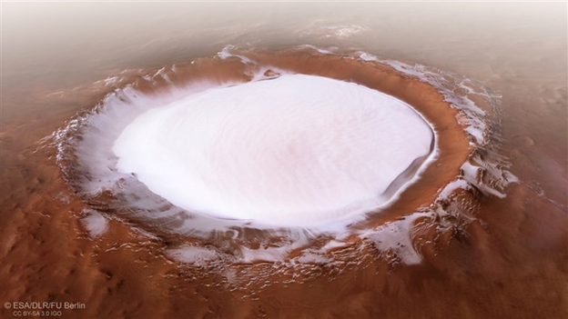 A spectacular shot of the Korolev Crater, a dish-shaped basin on the broad plain that surrounds the Martian north pole. Image Credit: ESA/DLR