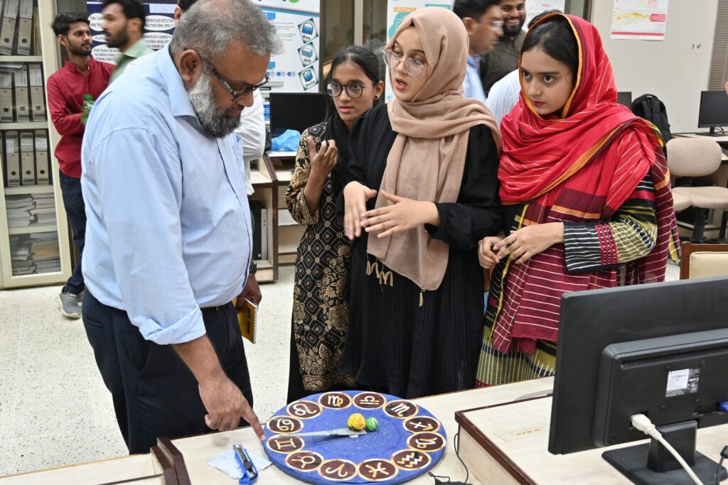 Another group of students briefing about their project to the judges of the Astronomy project competition. (Credits: NCBC NED UET)