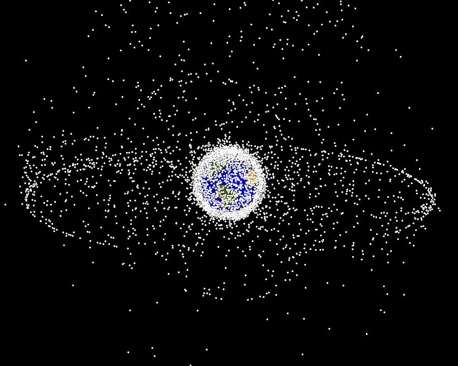 A computer-generated image representing the locations, but not relative sizes, of space debris as could be seen from high Earth orbit (HEO).