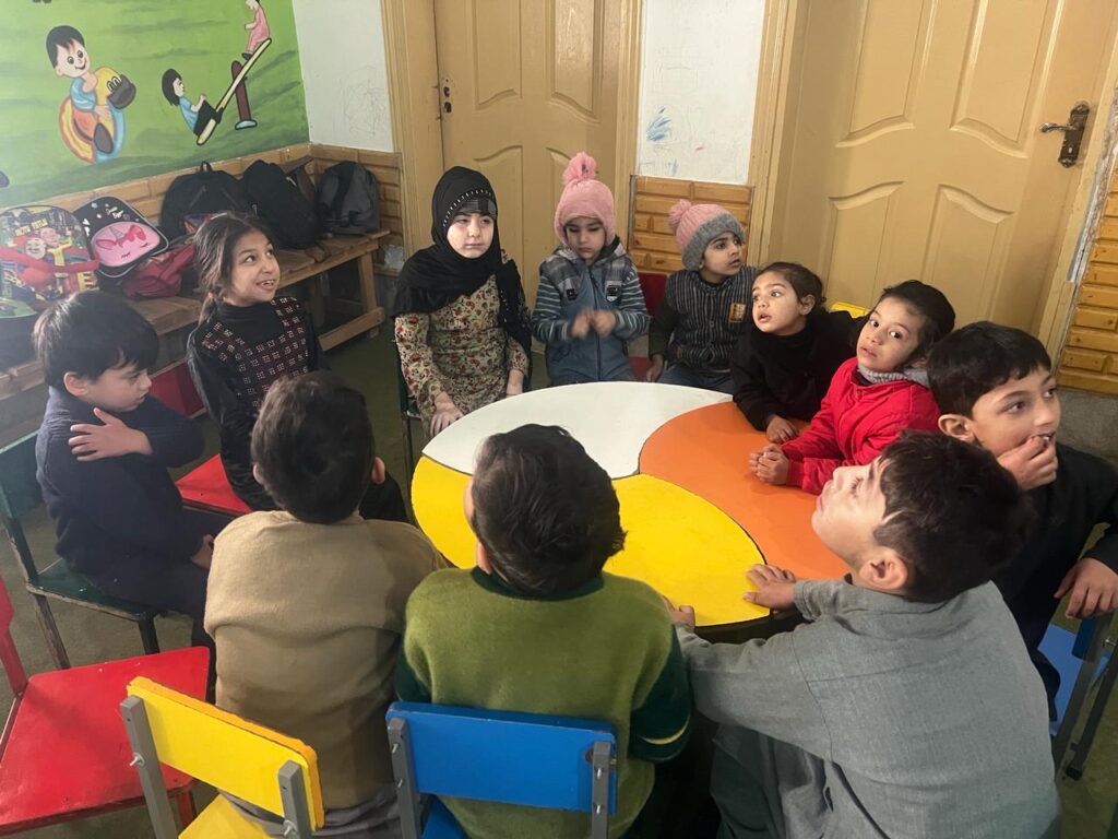 A picture of autistic children during a collective activity at Talha Autism Centre in Peshawar.